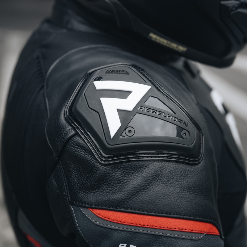 "Rebelhorn Veloce" juoda-fluo raudona odinė motociklininko striukė