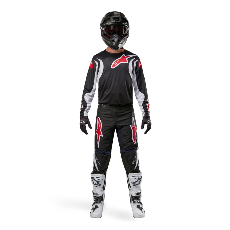 Alpinestars Fluid Lucent motokroso kelnės juodos, baltos ir raudonos spalvos