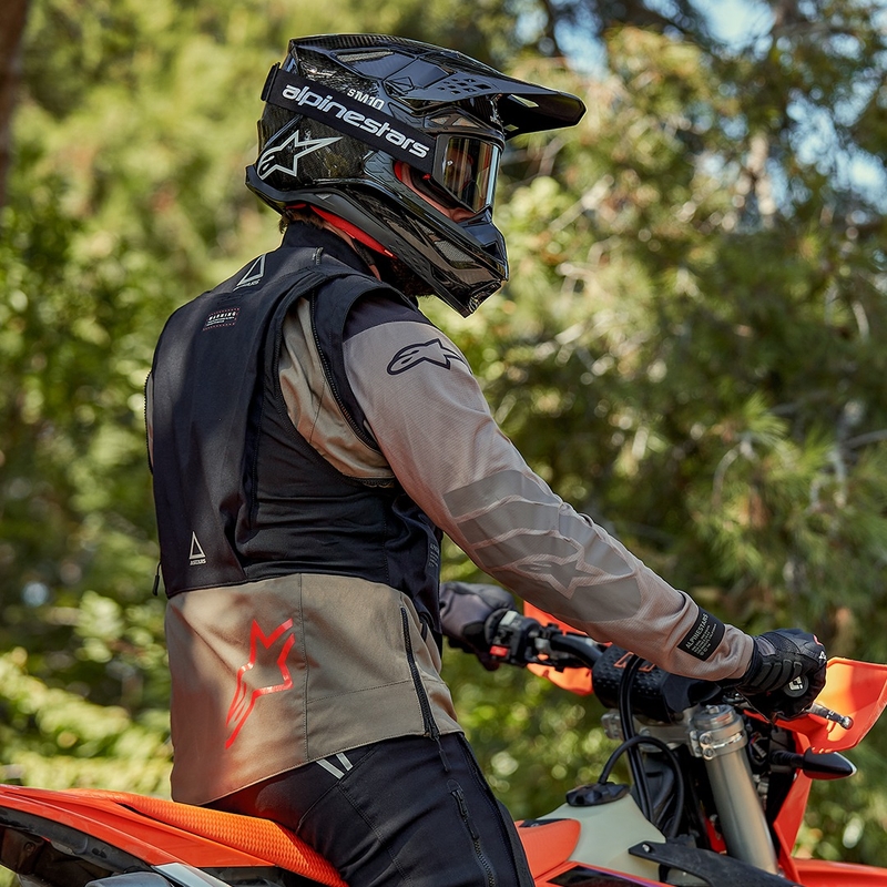 "Alpinestars Techdura" juoda-ruda-tamsiai mėlyna motociklininko striukė