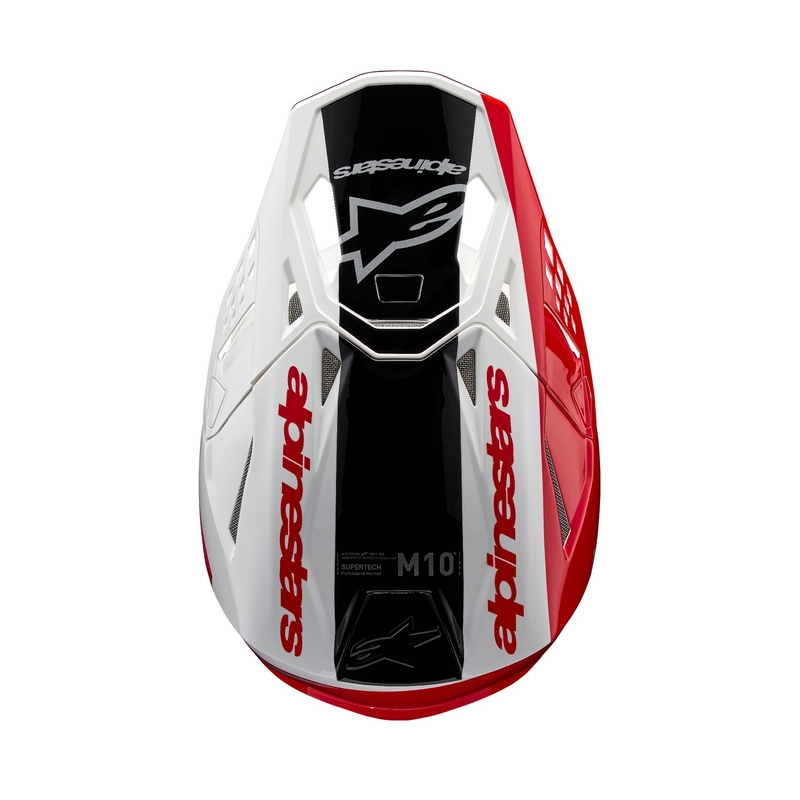 Alpinestars Supertech S-M10 Unite motokroso šalmas raudonos ir baltos spalvos