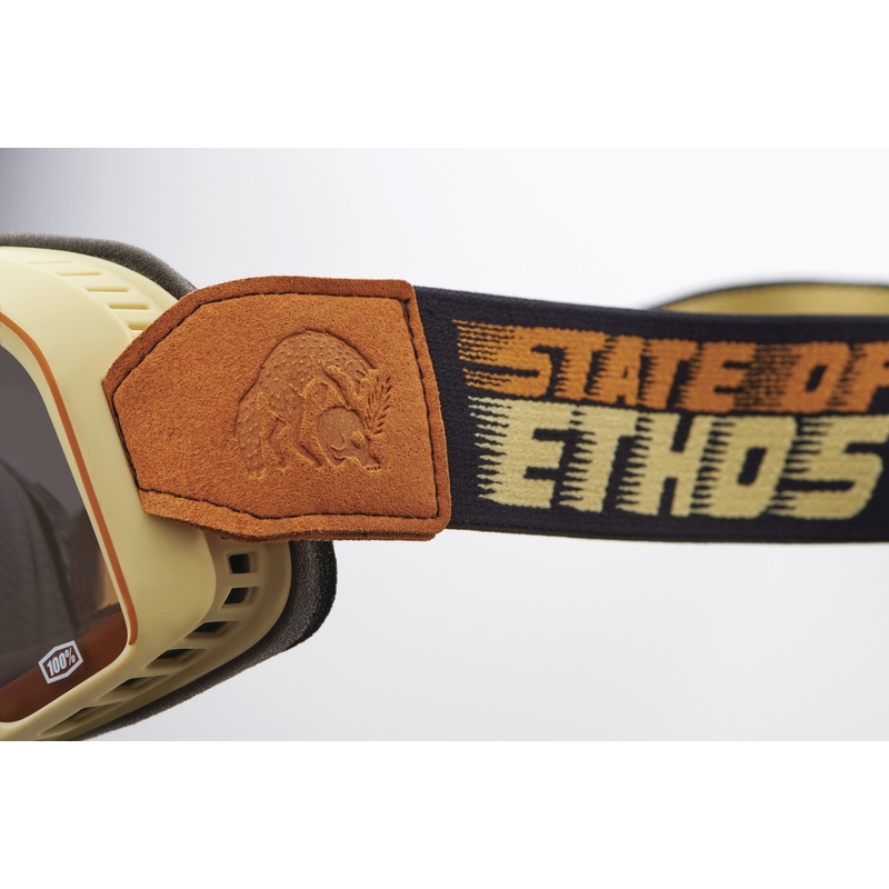 Motokroso akiniai 100% - JAV Barstow State Of Ethos bronze plexi