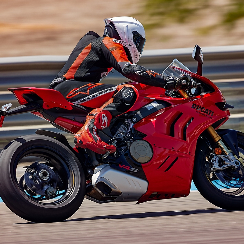 "Alpinestars Missile 2 Ward" juoda-fluo raudona-balta odinis motociklininko kombinezonas