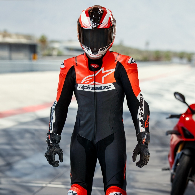 "Alpinestars Missile 2 Ward" juoda-fluo raudona-balta odinis motociklininko kombinezonas