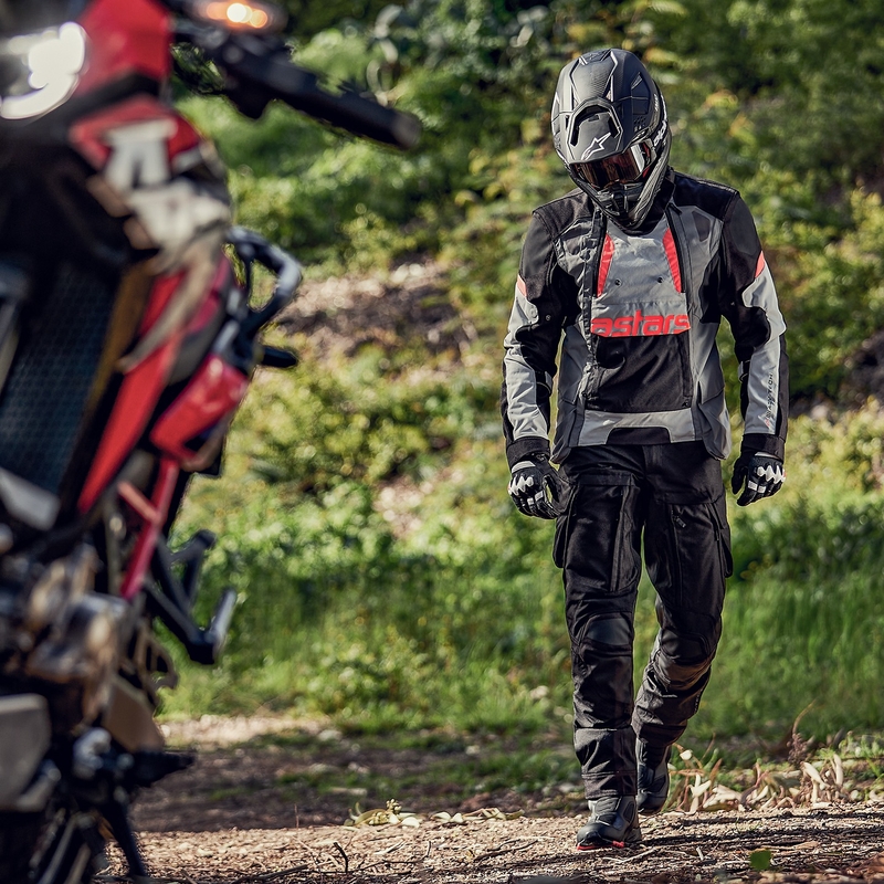 Alpinestars Halo Drystar šviesiai pilka-tamsiai pilka-juoda-fluo raudona motociklininko striukė