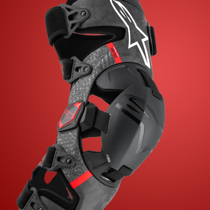 Alpinestars Supertech RK-10 Plasma juodos ir raudonos spalvos kelio įtvarai