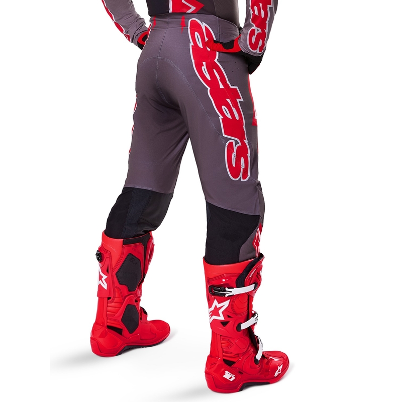 Alpinestars Supertech Lipan Smoke Red motokroso kelnės