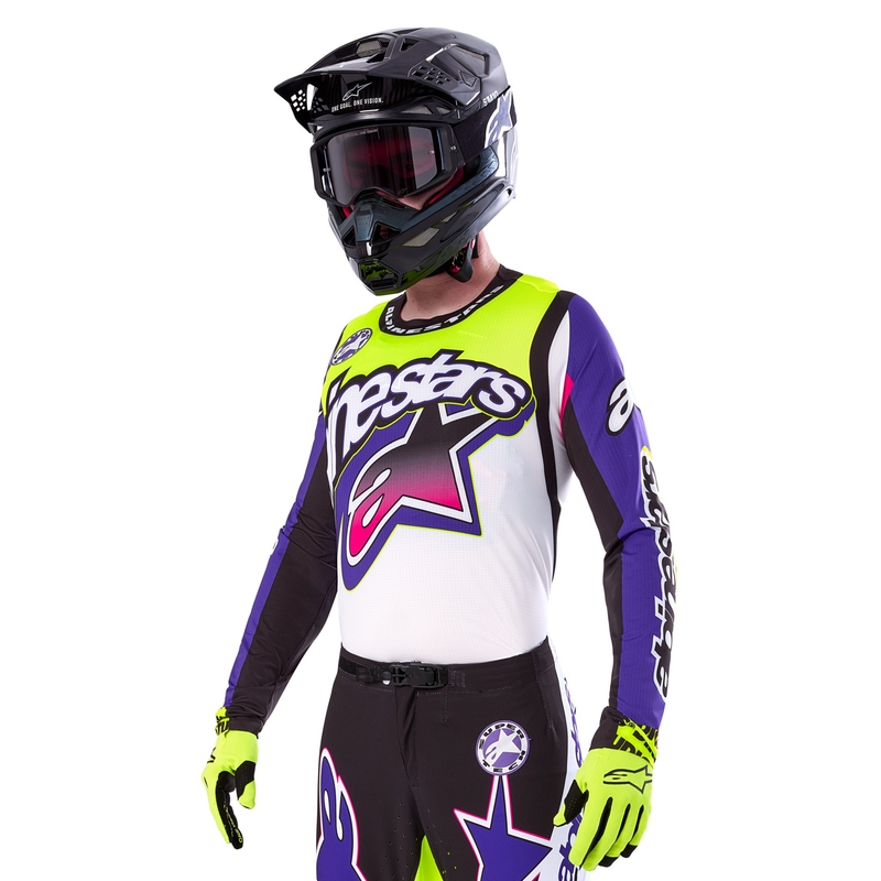 Alpinestars Supertech SX riboto leidimo "Dirt Studios" baltai-violetiniai-rožiniai-fluo geltoni motokroso marškinėliai