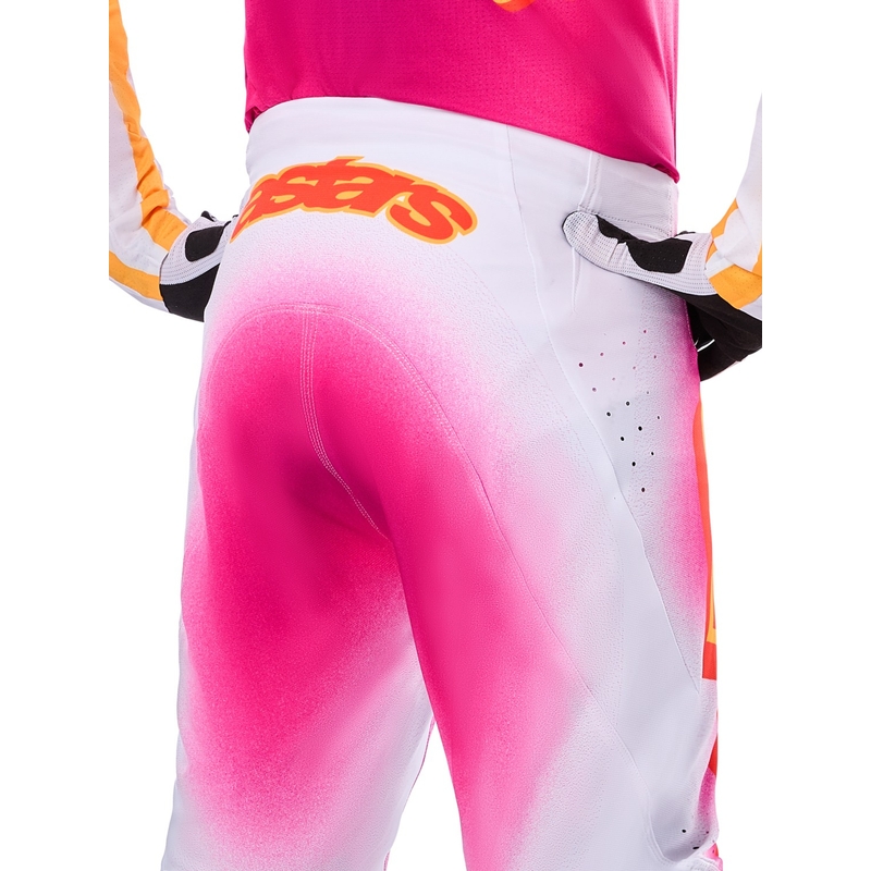 "Alpinestars Supertech" riboto leidimo MIG fluo rožinės-baltos-oranžinės motokroso kelnės