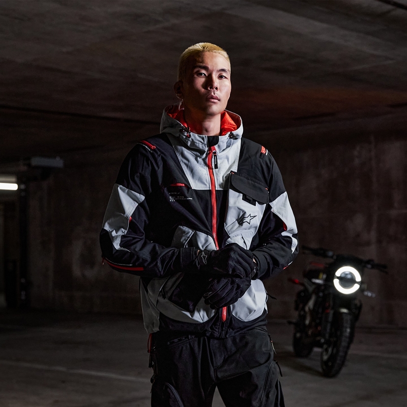 Alpinestars MOGRESS AIR juoda-mėlynai oranžinė motociklininko striukė