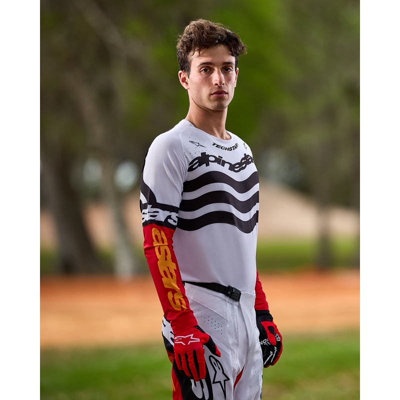 "Alpinestars Techstar" riboto leidimo "Deep black-white-fluo red-orange" motokroso marškinėliai