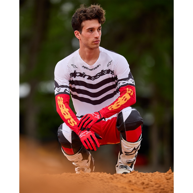 "Alpinestars Techstar" riboto leidimo "Deep black-white-fluo red-orange" motokroso marškinėliai
