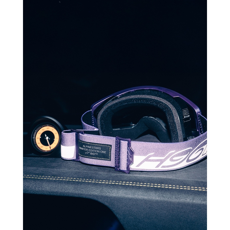 Alpinestars Supertech Vision Hunta96 XXV motokroso akiniai violetinės ir baltos spalvos su veidrodiniu sidabriniu stiklu