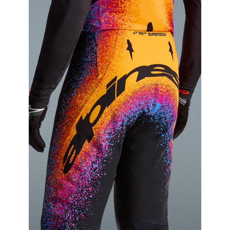 Alpinestars Supertech Limited Edition motokroso kelnės Black Hole - juodos