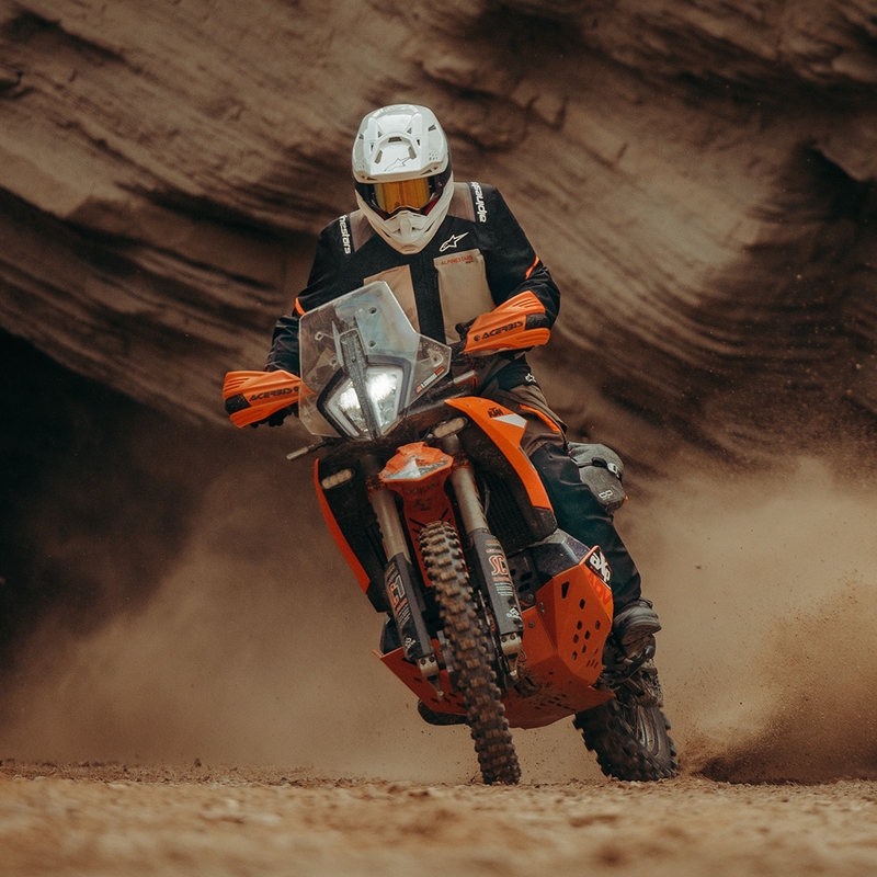 Alpinestars Andes V4 Drystar motociklo striukė kreminė-šviesiai ruda-juoda-fluorescencinė oranžinė