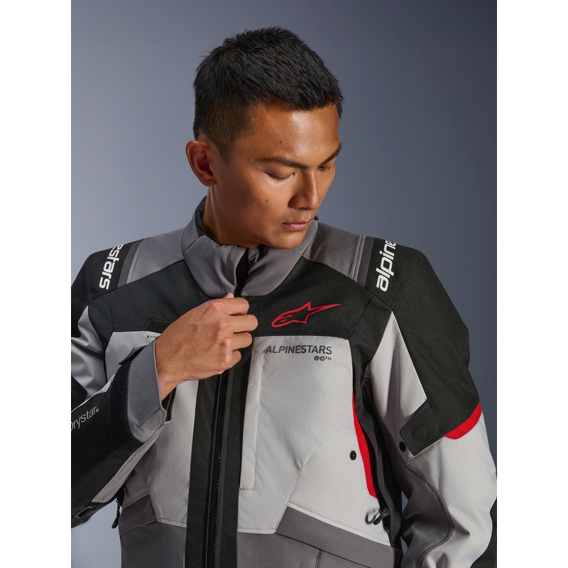 Alpinestars Andes V4 Drystar motociklo striukė tamsiai pilka-šviesiai pilka-juoda-raudona