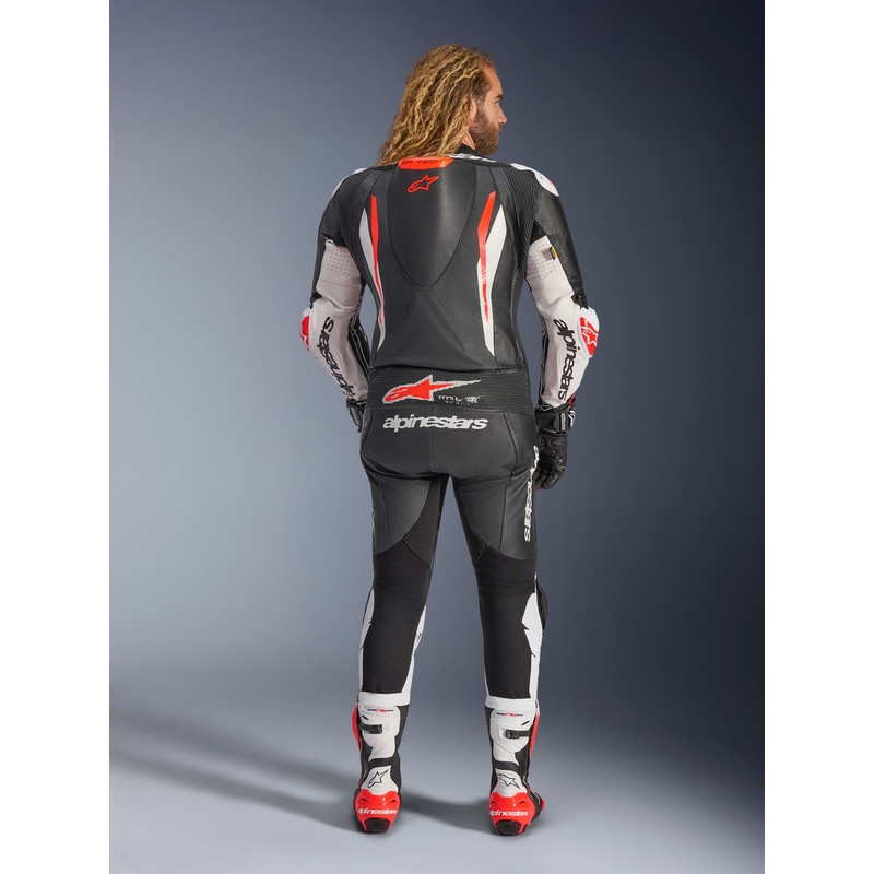 Alpinestars GP TECH V5 vientisas odinis motociklo kostiumas juodas-baltas-fluorescencinis raudonas