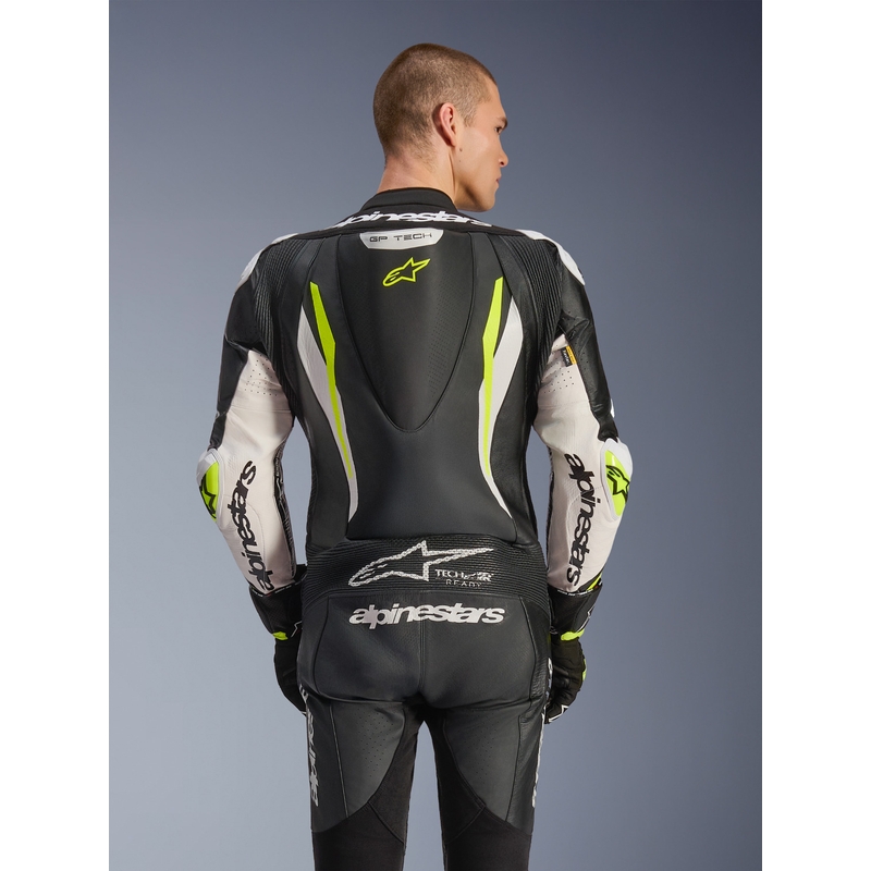 Alpinestars GP TECH V5 vientisas odinis motociklo kostiumas juodas-baltas-fluorescencinis geltonas