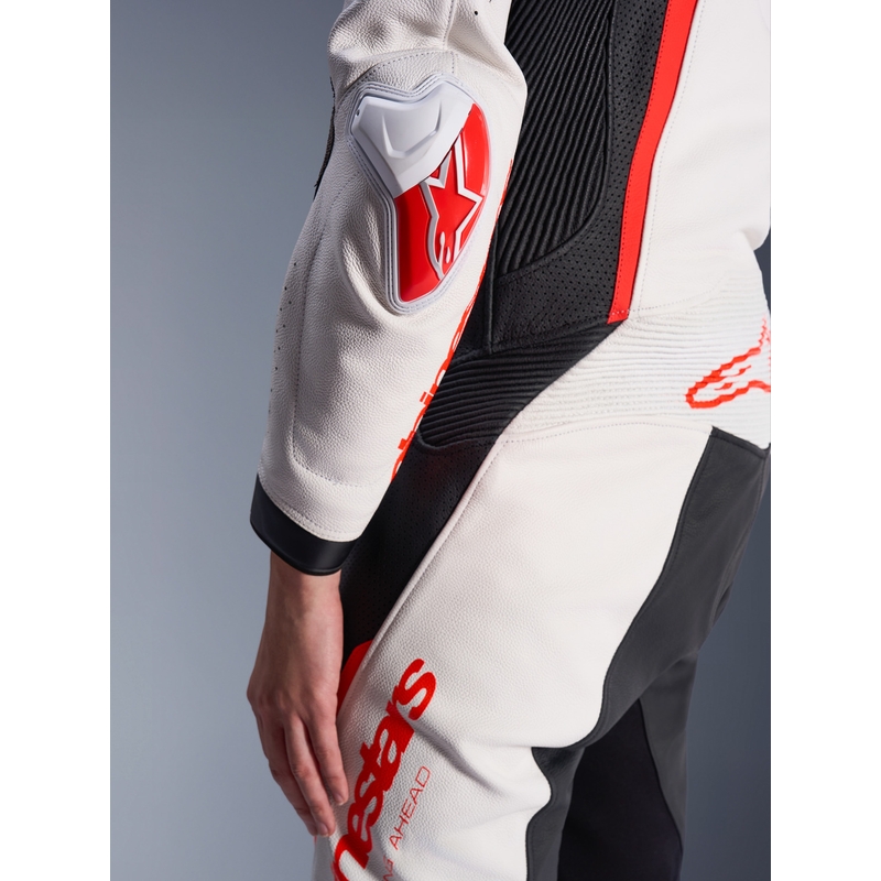Moteriškas vientisas odinis motociklo kostiumas Alpinestars Stella GP-R7 balta-fluorescencinė raudona-juoda