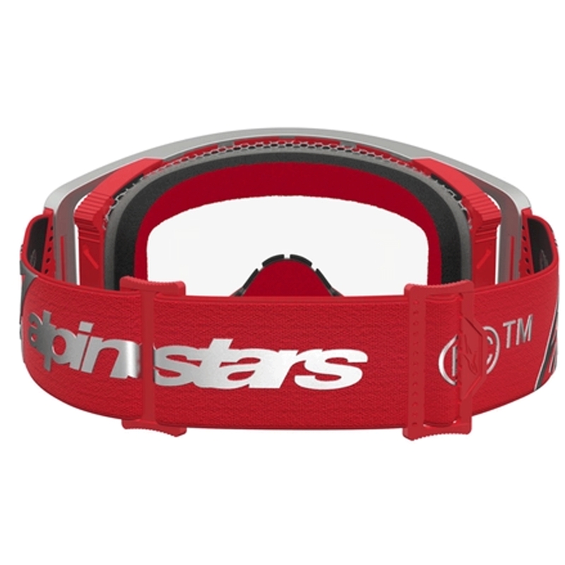 „Alpinestars Supertech Dura Air Fluid“ raudonos-sidabrinės spalvos motokroso akiniai su skaidriu plexiglasu