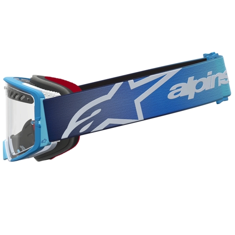 „Alpinestars Supertech Dura Air Fluid“ mėlynai sidabriniai motokroso akiniai su skaidriu plexiglasu