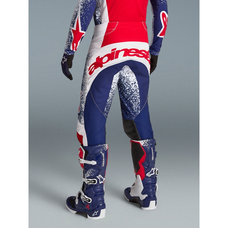 „Alpinestars Techstar Limited Edition Unity“ raudonos-baltos-mėlynos motokroso kelnės